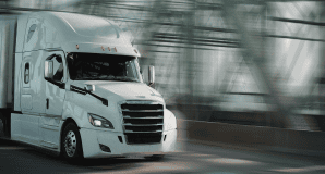 Freight truck driver and dispatcher coordinating loads at a dock