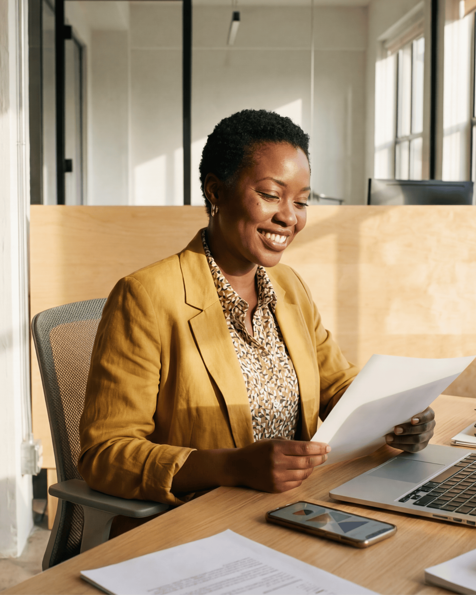 Client smiling while reviewing her Integra term sheet
