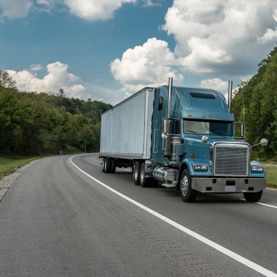 Owner-operator tractor-trailer on the highway