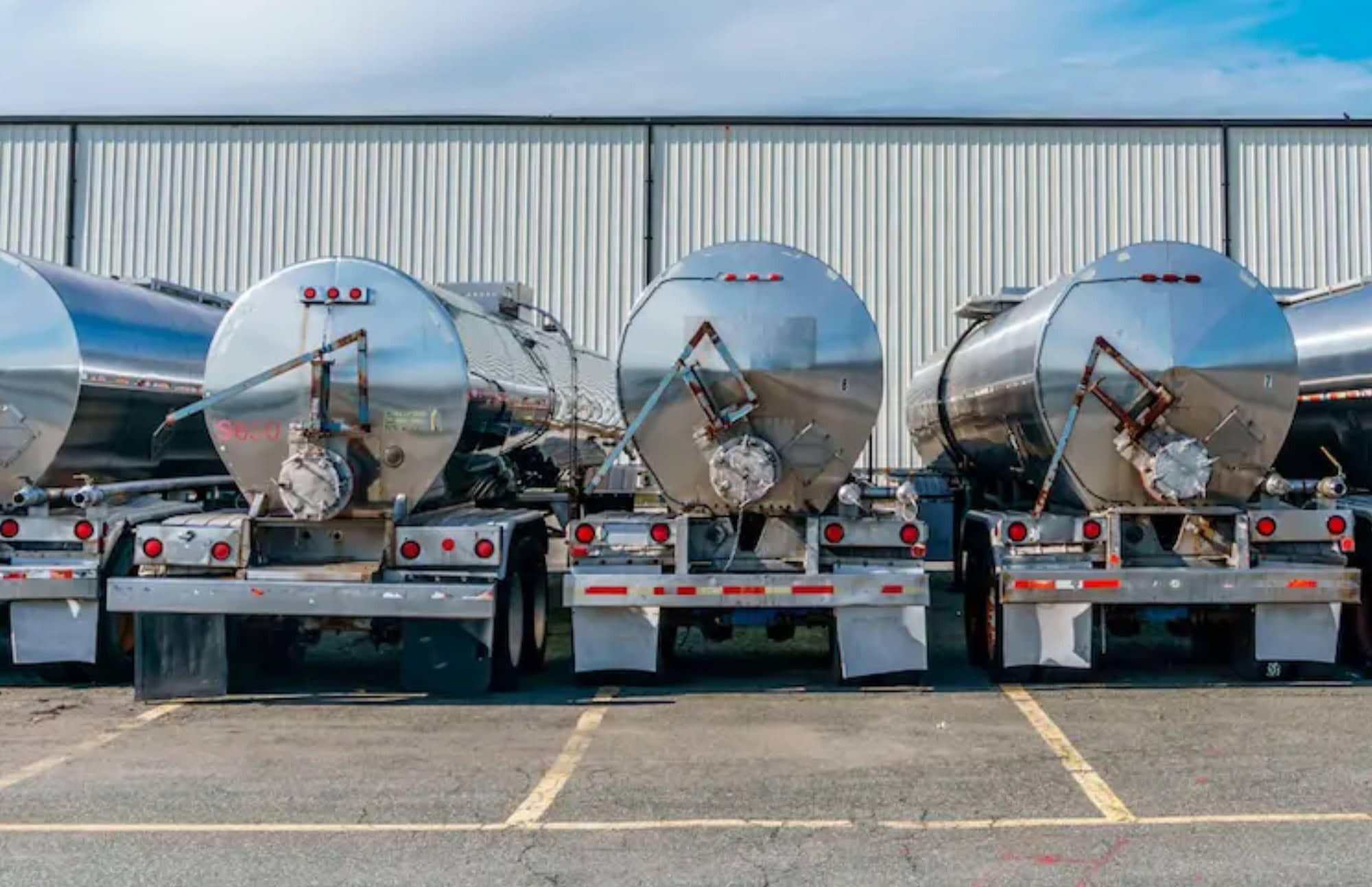 Tanker trailers staged at an oilfield freight yard