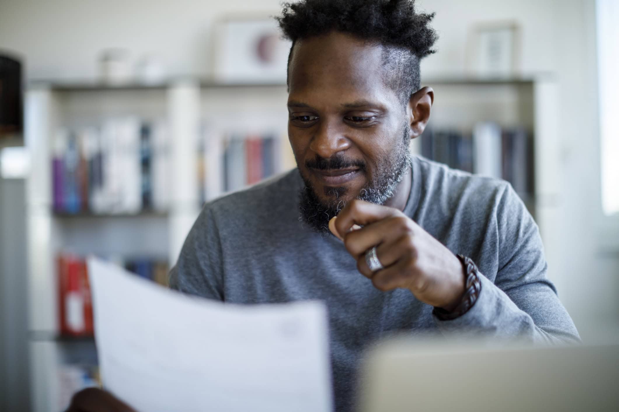 Client reviewing a factoring agreement