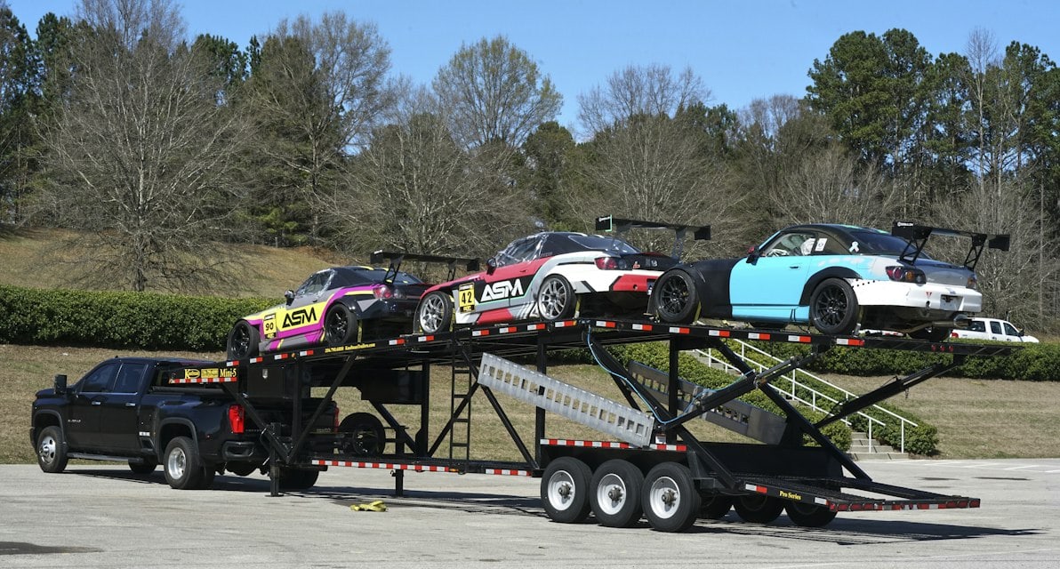 Car hauler trailer loaded with vehicles
